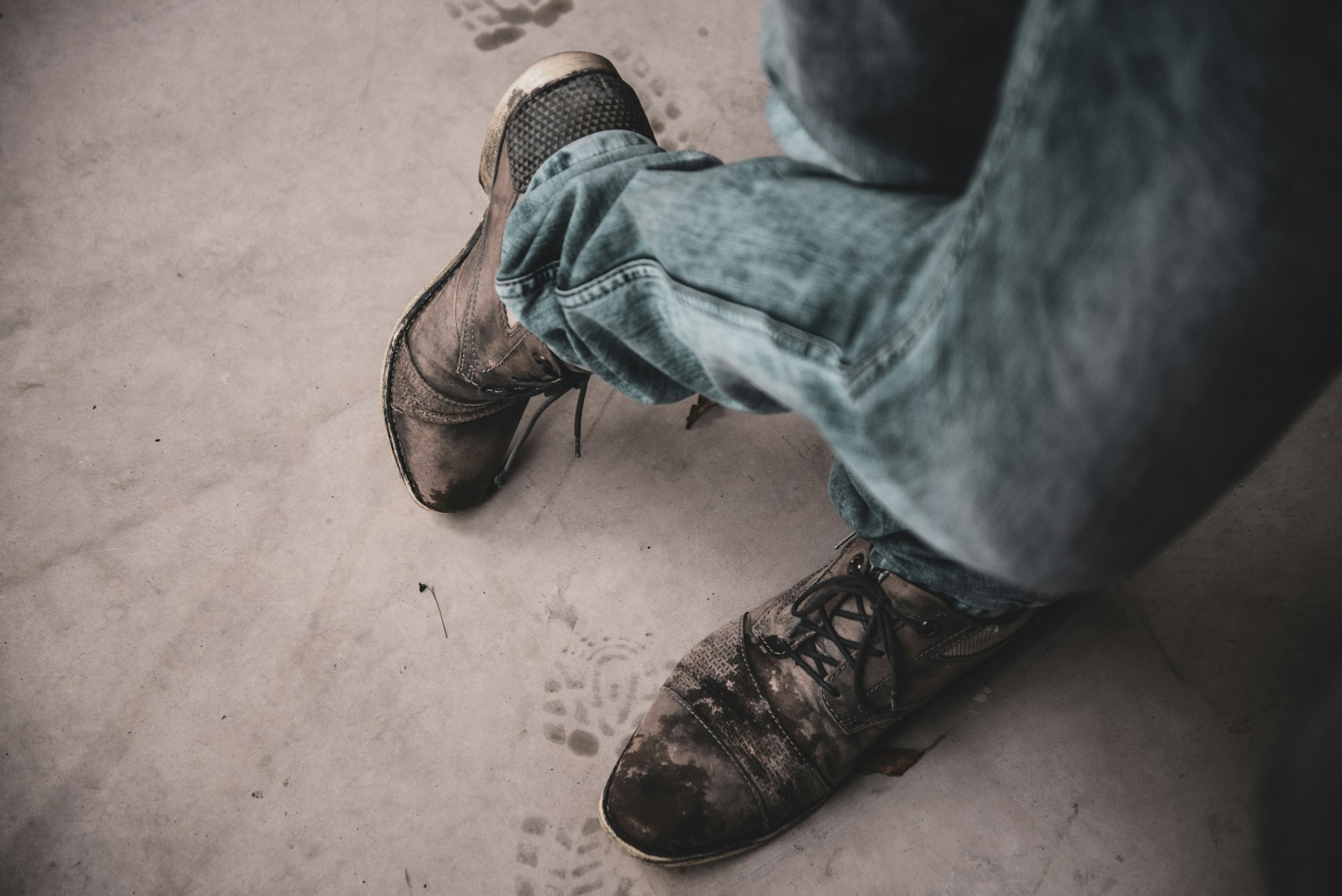 Worn leather footwear photographed from above
